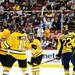 Michigan Tech celebrates after Jujhar Khaira scored the second goal in the first period at Joe Louis Arena on Saturday, Dec. 29. Michigan Tech won 4-0. Daniel Brenner I AnnArbor.com